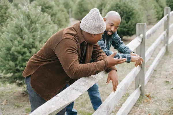 Renting Guide: Can You Rent A House At 18? father and son talking